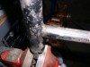 This could be why - it's cracked almost completely around at the welds on each side... 