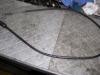 Heatshrink tubing covering the cracks, cable lubricated.